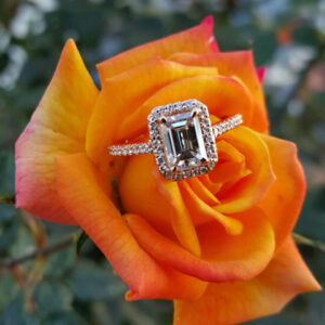 Emerald Shaped Diamond With Halo Set in Rose Gold Engagement Ring